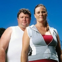 kövér házaspár sportruhában, kövér, elhízás